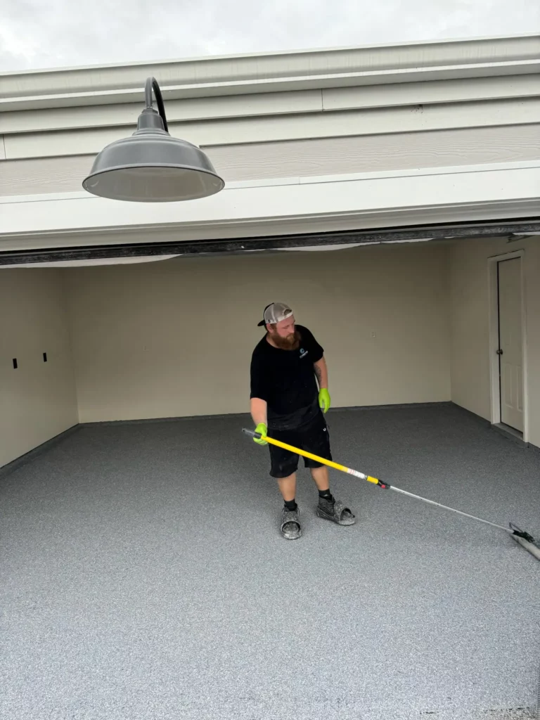 trevor shukers prepping garage floor after flake