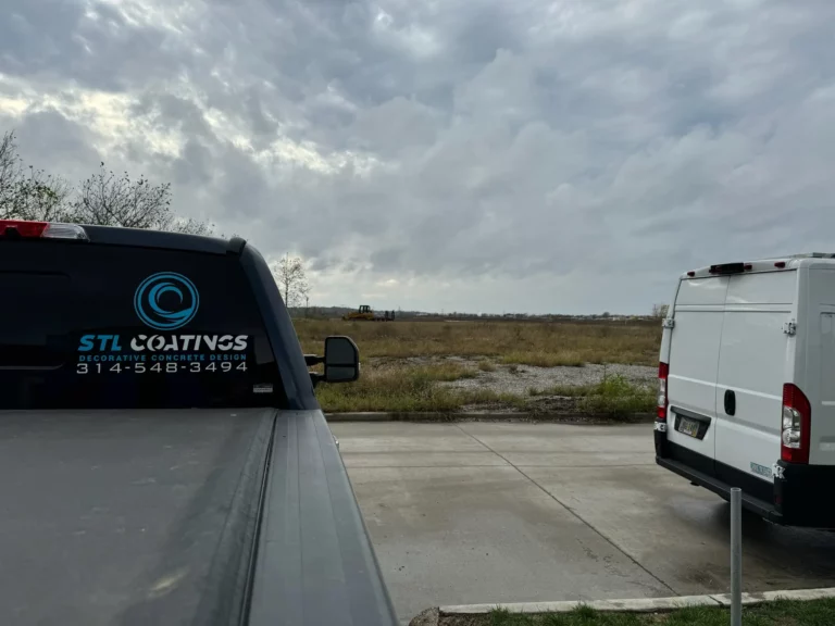 logo on truck looking out to undeveloped new town