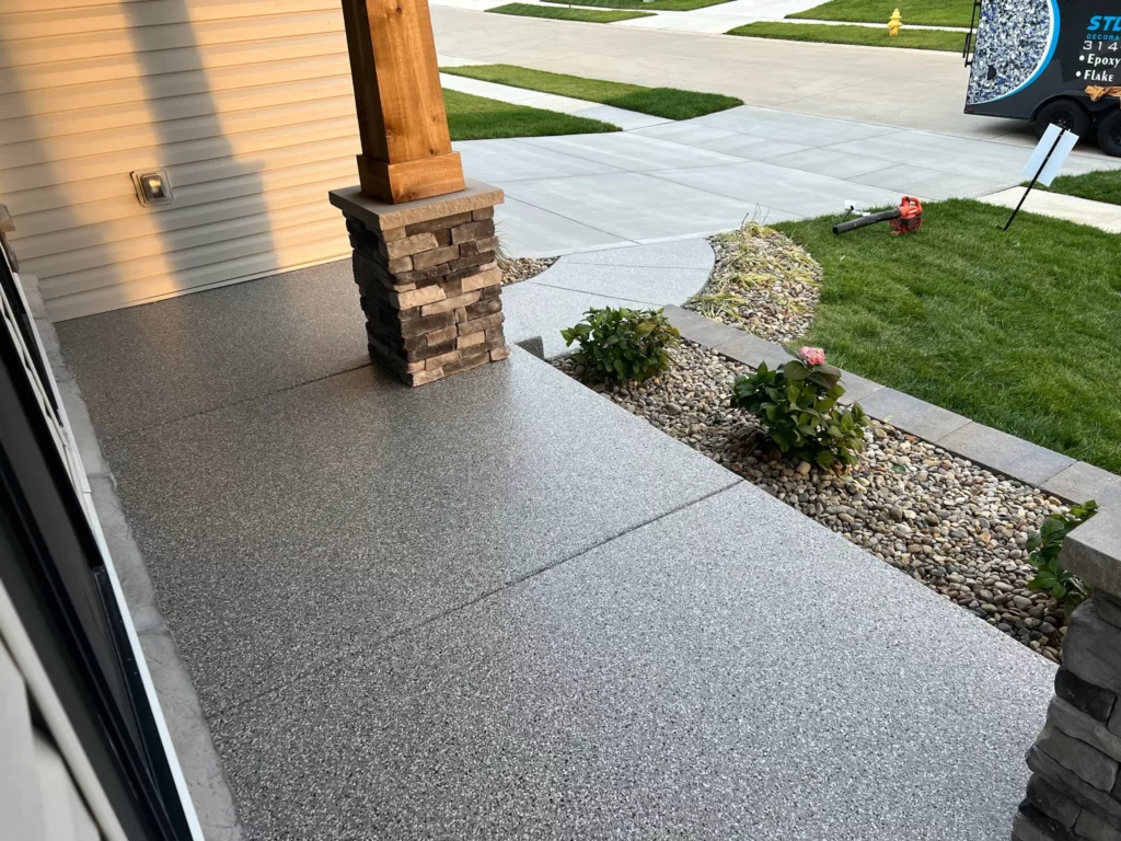 A stunning polyurea patio in St. Charles, Missouri, featuring a seamless and weather-resistant finish.