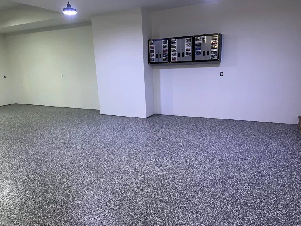 A pristine epoxy garage in O’Fallon, Missouri, with a smooth and professional finish.