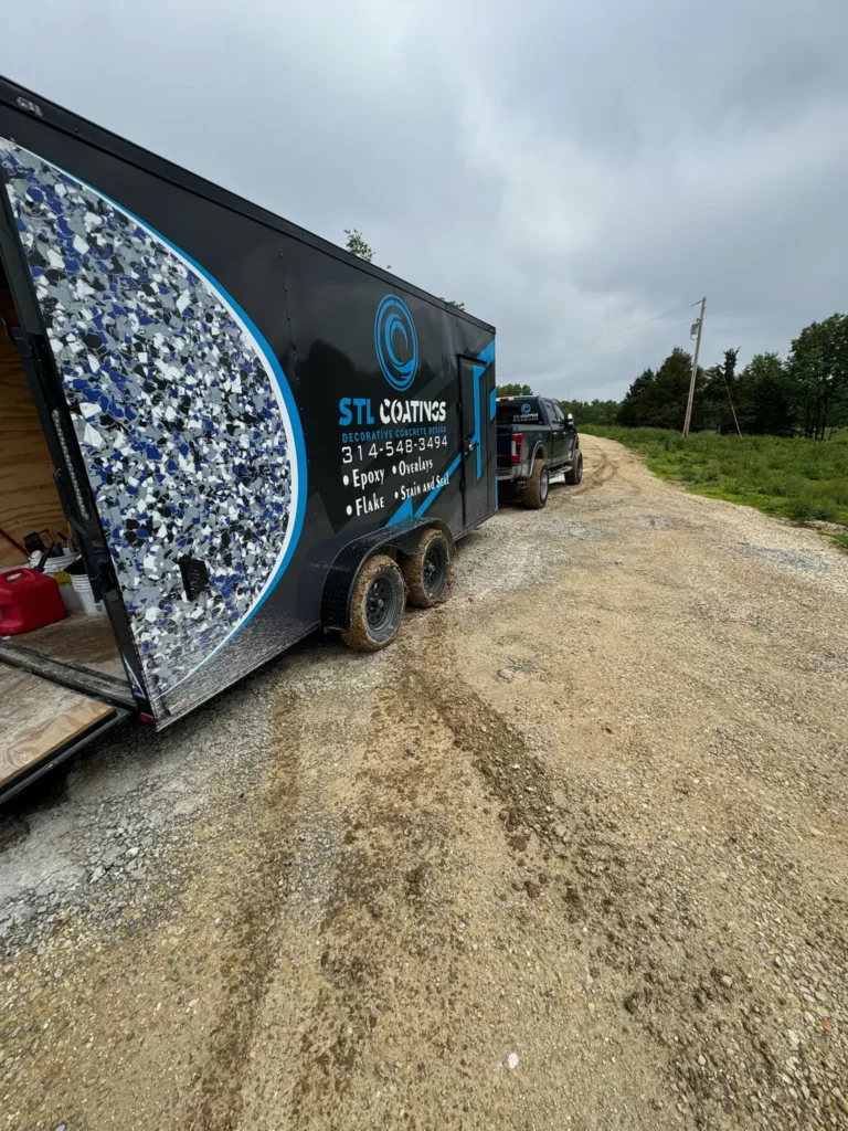 STL Coatings trailer and truck parked on a gravel road near O’Fallon, Missouri.